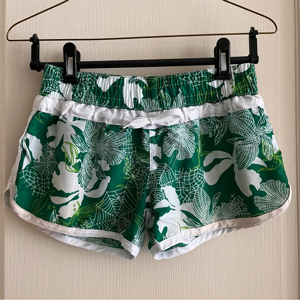 Green board shorts.
